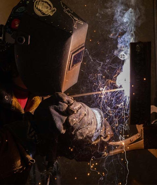 Student practicing stick welding